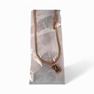 New "K" necklace faux herringbone gold tone chain New in plastic packaging